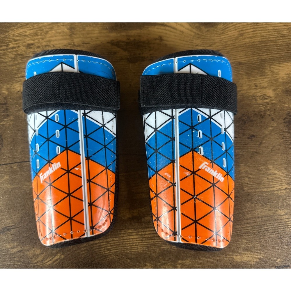Franklin Sports Field Master Kids Small Shin Guards 2pk Blue/Orange.  4ft 7in